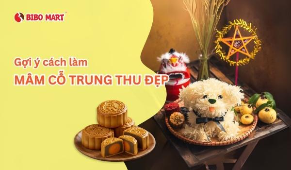 Mẫu chữ khắc dưa hấu Trung Thu trên mâm cỗ gia đình ấm cúng, lung linh ánh nến.
